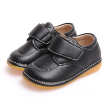 Feste schwarze Baby-Kleinkind-Schuhe weiche echtes Leder-Schuhe